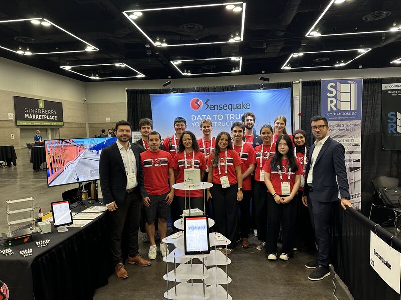 Team visiting the Sensequake booth at 13NCEE